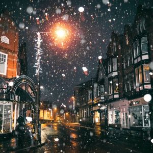 rain of snow in town painting